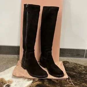 Miu Miu brown suede boots.